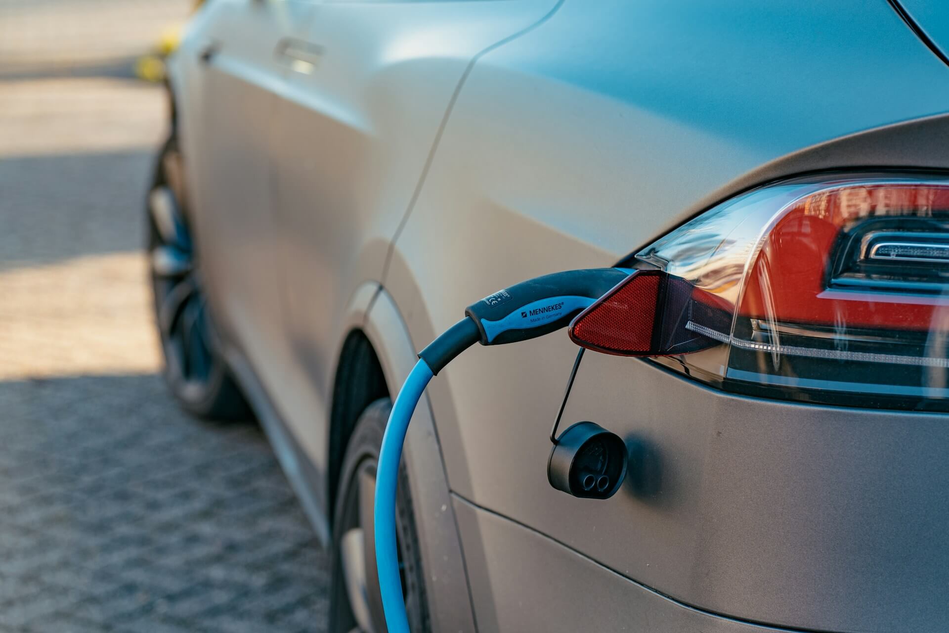 a Tesla electric car on a charge