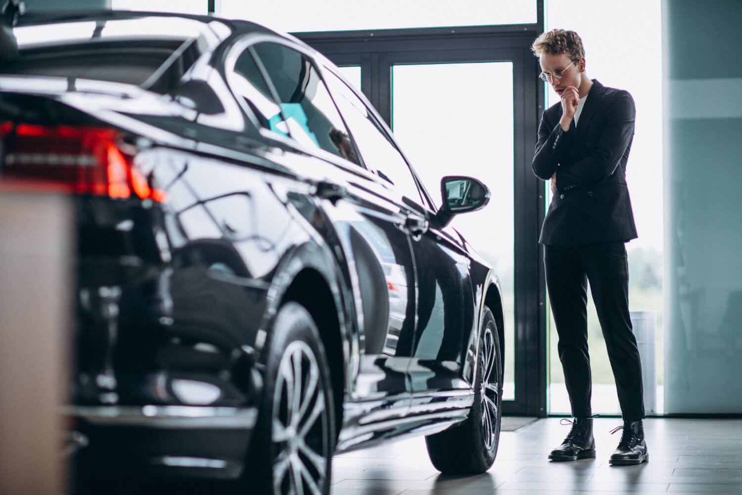 a man is choosing a car for his business