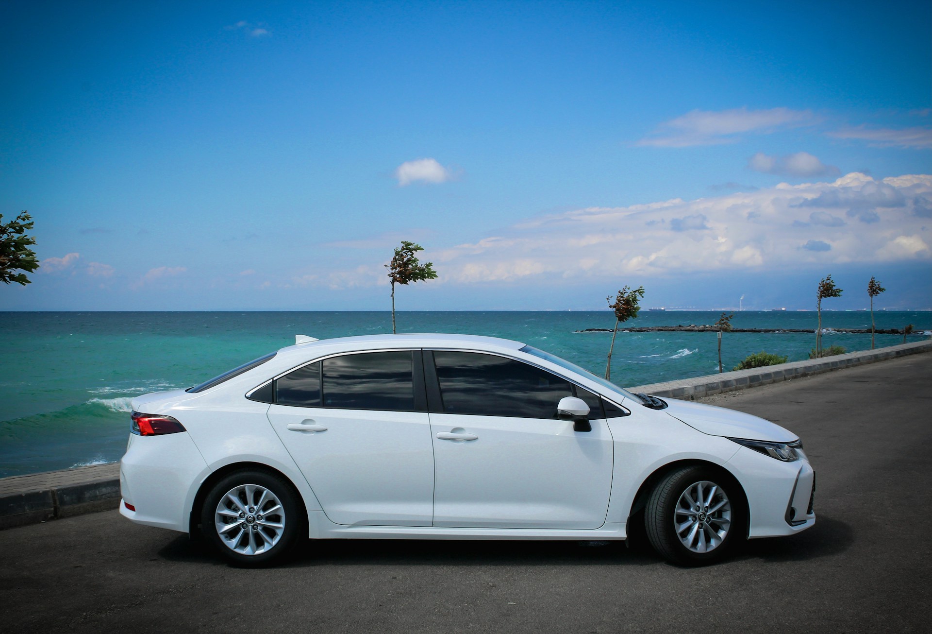 Toyota Corolla on the beach