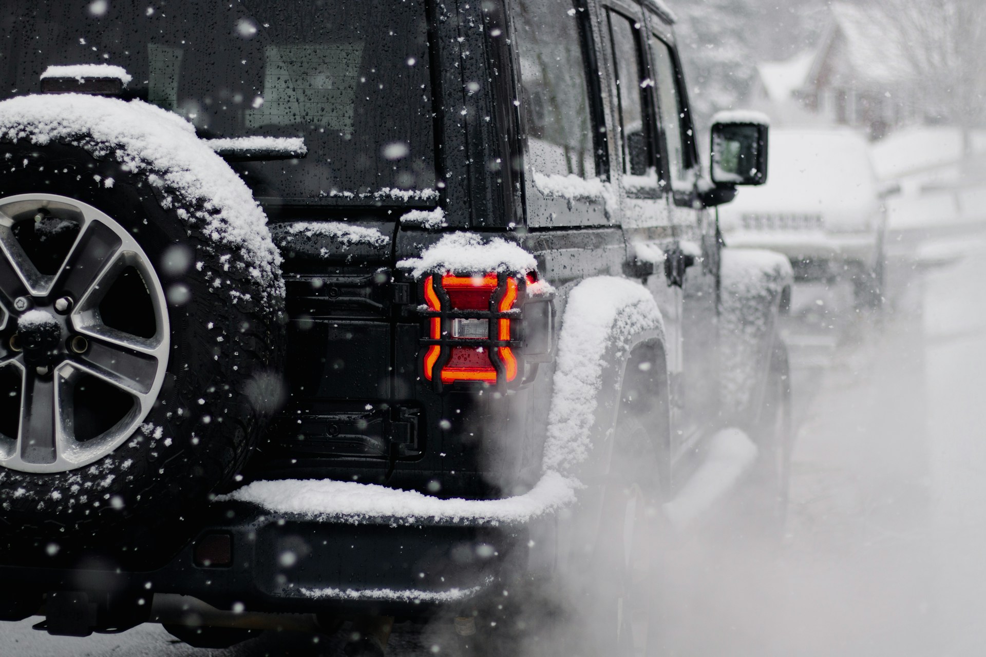 large truck driving through snow