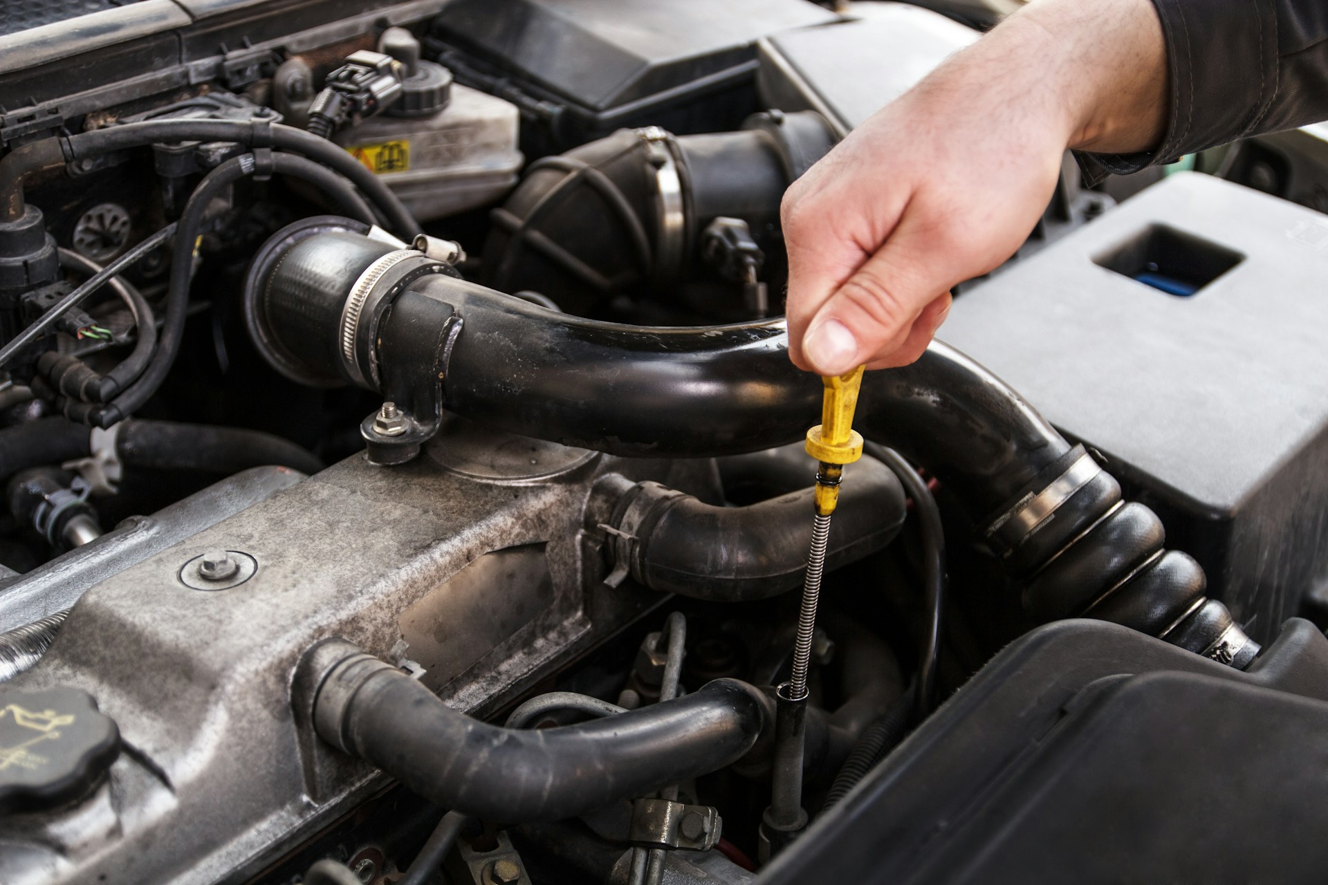 mechanic testing a salvage car engine