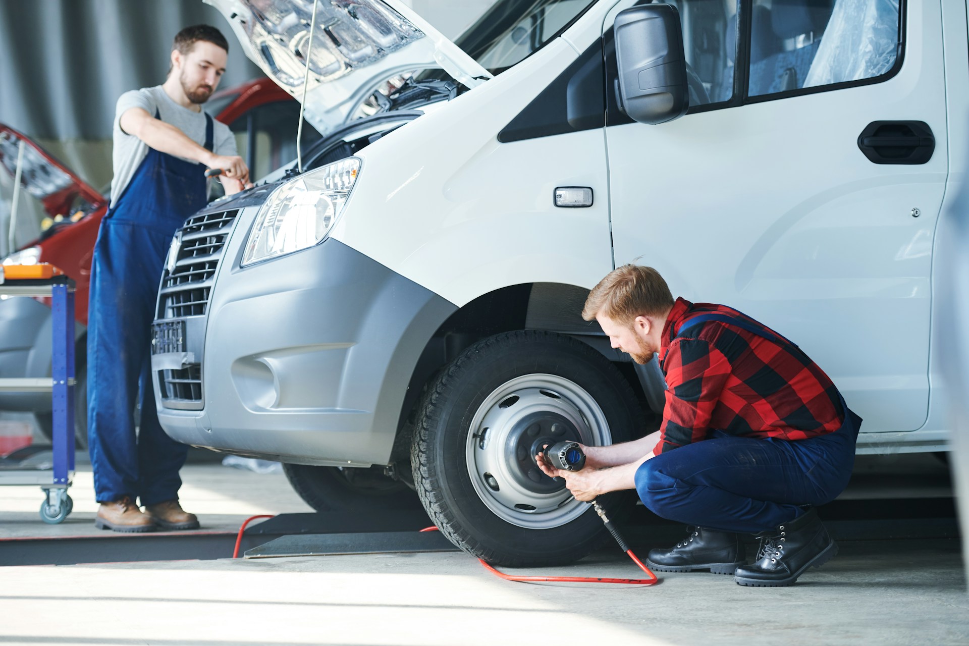 mechanics rebuilding a truck
